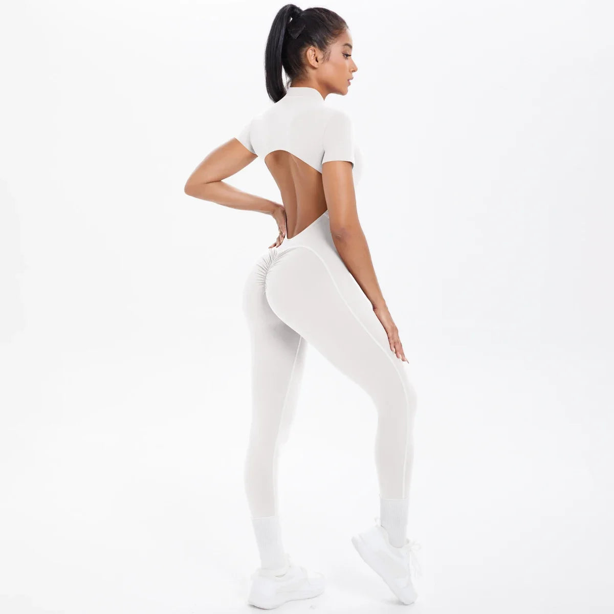 PERFORMANCE JUMPSUIT [OPEN-BACK FULBODY SUIT]